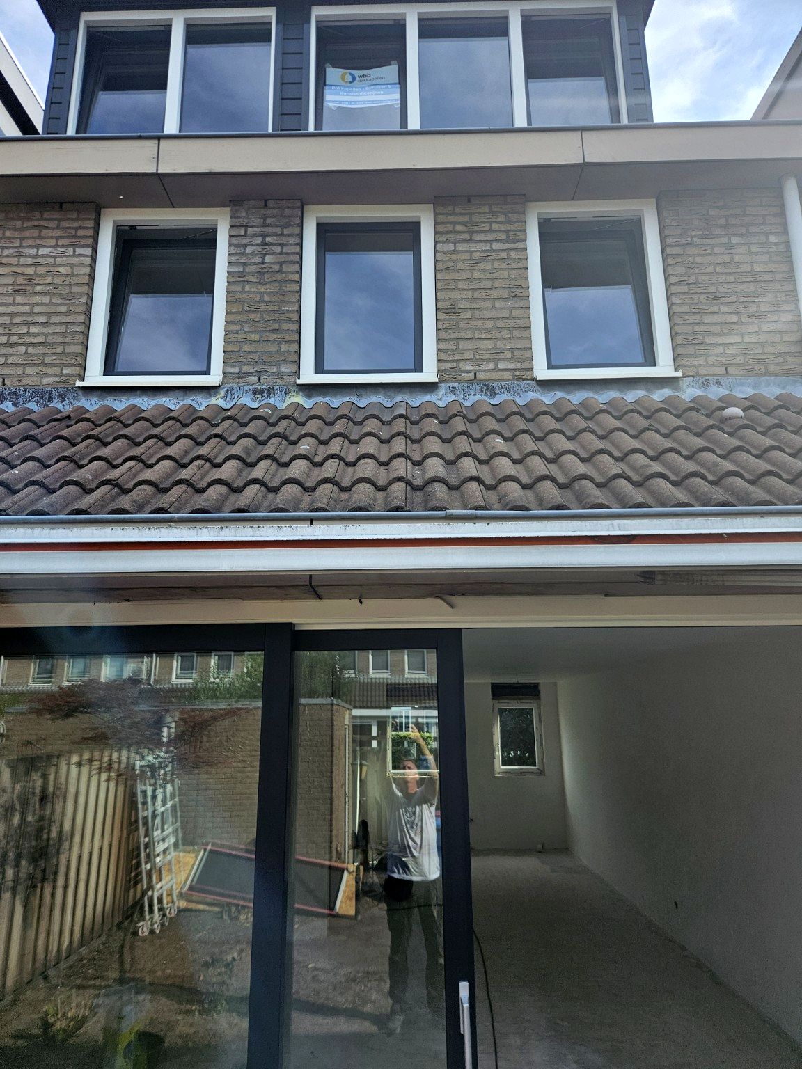 Achtergevel met grote schuifpui